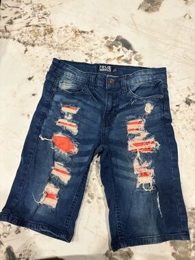 Indigo Skinny Jeans with Red Patch Distressed Detail